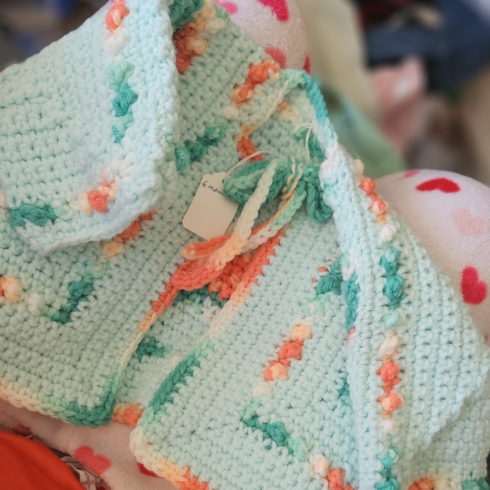 Crocheted teal, coral sweater